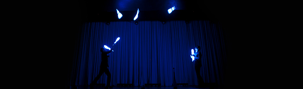 Daniel and Julius Juggling 9 clubs on stage